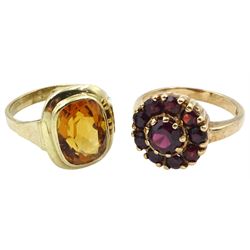 Gold single stone citrine ring and a gold garnet cluster ring, both hallmarked 9ct