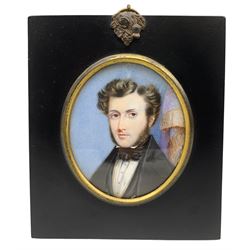 Mid 19th century half length oval portrait miniature, watercolour on ivory of a young gentleman wearing a black coat and stock 8cm x 7cm in ebonised frame.  The reverse inscribed 'Cheltenham 28 May 1841, painted by Mrs Wright, born without hands'. This item has been registered for sale under Section 10 of the APHA Ivory Act