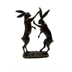 Bronze figure group modelled as two boxing hares, with foundry mark, H28cm