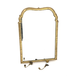 Mid 19th century gilt framed upright wall mirror, with two brass candle sconces, 67cm x 100cm