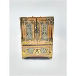 Oriental jewellery chest fitted with small drawers and enclosed by mother of pearl decorated doors and with metal mounts H25cm