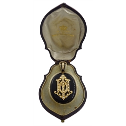 Victorian black enamel mourning pendant, with gold mounted monogrammed seed pearl decoration, retailed by W. Payne, 58 Queen Victoria Street, in fitted velvet and silk lined leather case
