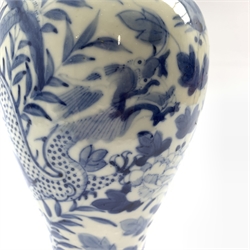 19th century Chinese baluster vase, decorated in underglaze blue with scrolling dragon and foliage, domed cover with Dog of Fo finial, Kangxi four character mark H32cm 