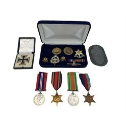 German 1st class Iron Cross in box of issue, the pin marked 113, Luftwaffe Demjansk arm shield, WWII Burma Star, War medal, Defence medal 1939-1945 medal Burma Star Association badge and other items