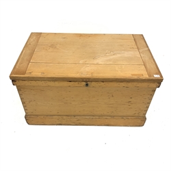 Large early 20th century pine blanket box, with wrought iron carry handle to each end and skirted base, W104cm, H58cm, D65cm