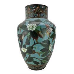 Late 19th century Japanese cloisonne floor vase, of shouldered ovoid form, decorated with exotic birds and insects amongst peonies, against a blue ground, the cylindrical neck decorated with a continuous scene of dragons amidst clouds, H64cm