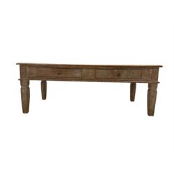 Painted pine coffee table, rectangular top over two drawers, raised on square tapering supports 