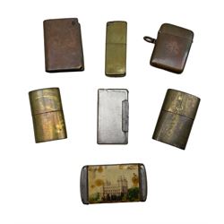 Three Trench type brass lighters, novelty book form lighter, Victorian vesta case, Art Deco silver-plated lighter and another vesta (7)