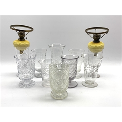  Collection of ten various glass celery vases and a pair of oil lamps with moulded glass reservoirs  