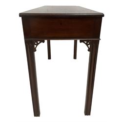 George III mahogany side table, rectangular top with moulded edge, fitted with two cock-beaded frieze drawers over pierced scrolled brackets, raised on moulded square supports with inner chamfer