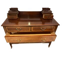 Edwardian inlaid mahogany dressing chest, raised bevelled swing mirror over two small trinket drawers, rectangular top with inlaid banding fitted with two short and two long drawers, raised on square supports with brass and ceramic castors 