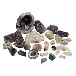 A selection of semi precious stones, crystals and geodes including amethyst and rose quartz