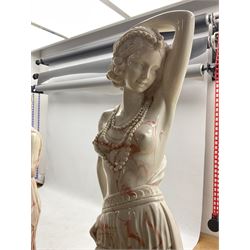 Near pair marbled statues of a Dancing Girl and Classical Maiden on pedestal columns with lights H154cm