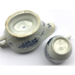  18th Century Caughley strap fluted sauce boat decorated in blue with a spray of flowers within a floral cartouche, open crescent mark L13cm, circa 1775 and an 18th Century Worcester blue and white cup   