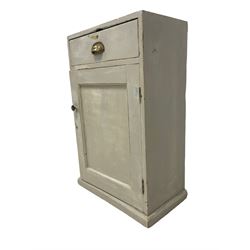 Early 20th century painted pine floor standing cupboard, fitted with single drawer over panelled cupboard door