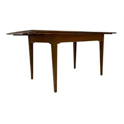 Mid-20th century teak dining table, pull-out extending top with fold-out leaf, on square tapering supports, retailed by Heals