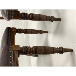 Set seven late Victorian mahogany dining chairs, leaf and scroll carved cresting rail centred by floral roundel over pierced and fluted splat, faux leather upholstered seats, raised on turned supports 