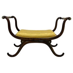 20th century stained beech bedroom stool, curved x-frame with turned stretchers, upholstered in gold fabric