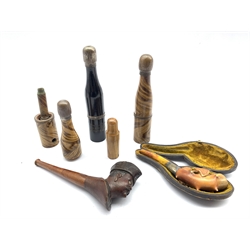 Novelty pipe in the form of a champagne bottle inscribed 'Franco-British Exhibition London 1908' H15cm, two others, unmarked, Meerschaum cheroot holder with floral carved decoration, pipe with carved head bowl and  a miniature glass flask in treen case