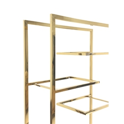 Gilt metal 'Hollywood Regency' etagere, with six cantilevered display shelves, (No glass for shelves), W90cm, H180cm, D36cm
