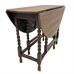 18th century and later oak gateleg table, the oval drop leaf top raised on bobbin turned and block supports united by stretcher 