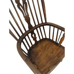 19th century Windsor chair, the spindle back over saddle seat, raised on turned supports 