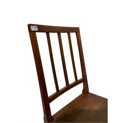 Late George III fruitwood rocking chair, with boarded seat