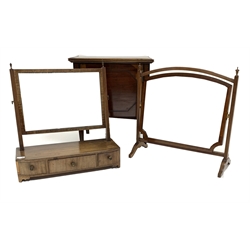19th century mahogany toilet swing mirror with reeded uprights and three trinket drawers, (W58cm) together with another swing mirror (W60cm) and a mahogany cupboard raised on square tarped supports, (W55cm)