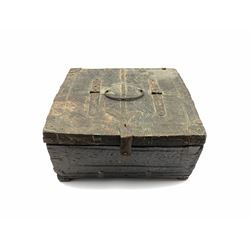 Indian wooden casket with hinged lid and carrying handle, metal banded with incised and carved decoration, W29cm x H15cm 