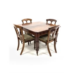 Late Victorian mahogany extending dining table, with two additional leaves, raised on turned supports with brass cup and ceramic castors (106cm x 107cm, H74cm) together with a set of four Victorian mahogany dining chairs, with drop in upholstered seats, raised on turned front supports, stamped with Victorian registration mark (W45cm)