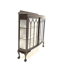 Early 20th century mahogany display cabinet, two doors enclosing two shelves, raised on ball and claw supports 