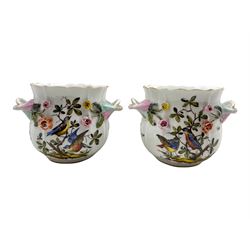 Pair of Continental flower encrusted vases, each hand-painted with birds H12.5cm 