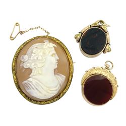 Gold carnelian and bloodstone circular swivel fob, stamped 9ct gold, similar oval swivel the stone set surround stamped 10ct, the pendant mount tested as gilt and a gilt cameo brooch (3)