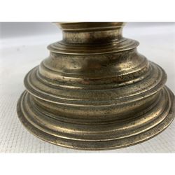 16th/ 17th century Flemish brass pricket candlestick, of squat form with disc knopped stem and foot, slightly dished  drip pan and iron spike, H16cm 