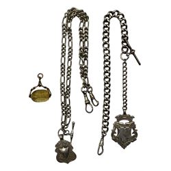 Silver graduated watch Albert chain, with T-bar, clip and silver medallion, and a silver long and short link Albert chain with T-bar, two clips and a silver medallion, together with a paste set swivel fob in a gold plated mount (3)