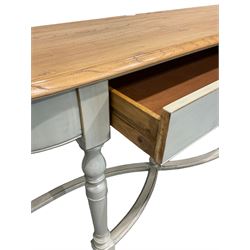 Contemporary console table, the elm top over painted base, fitted with one drawer, raised on turned supports, united by stretchers  
