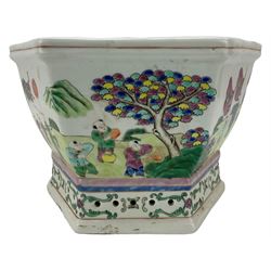 20th century Chinese hexagonal form jardiniere, the exterior enamelled with a procession of figures and musicians in a mountainous landscape, on pierced base, W27cm x H19cm. Provenance: From the Estate of the late Dowager Lady St Oswald