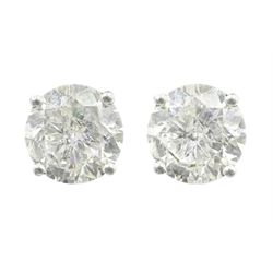 Pair of 18ct white gold single stone round brilliant cut diamond stud earrings, total diamond weight 2.04 carat, with certificate