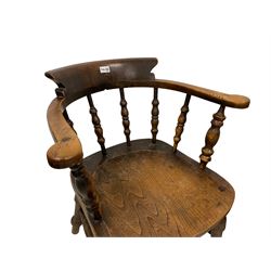Pair 19th century elm and beech Captains smokers bow chairs, spindle tub shaped back with shaped arm rests, the saddle seat,raised on turned supports united by turned double H stretcher