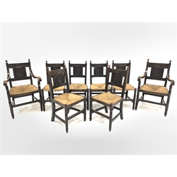  Set eight (6+2) early 20th century dark oak dining chairs, ball finials over floral carved back panels, string seats raised on ring turned front supports with stretchers, W58cm (Max)  