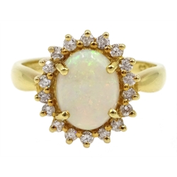 18ct gold opal and diamond cluster ring, hallmarked,  retailed by Jill Freeman, in original box