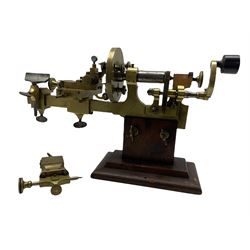 19th  century brass watchmakers lathe, in stained pine case 