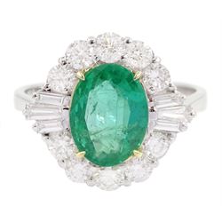 18ct white gold oval cut emerald, round brilliant cut and tapered baguette cut diamond ring, stamped 750, emerald 1.41 carat, total diamond weight 0.82 carat, with World Gemological Institute report