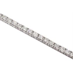 White gold round brilliant cut diamond line bracelet, stamped 18K, total diamond weight approx 2.50 carat 