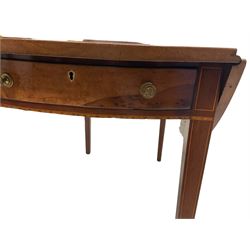 George III satinwood Pembroke table, the drop leaf circular top over one false and one real drawer with birds eye veneer fronts, the drawers with bone escutcheons and brass handles decorated with poppies, the apron decorated with inlaid geometric boxwood patterns, the square tapering supports with boxwood stringing