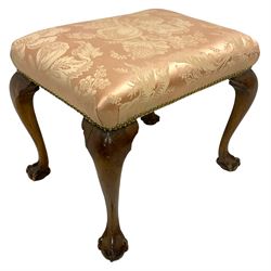 Early 20th century Georgian design mahogany footstool, seat upholstered in foliate patterned pale peach damask fabric, raised on cabriole supports terminating in ball and claw feet
Provenance: From the Estate of the late Dowager Lady St Oswald