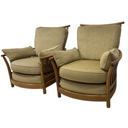 Ercol - pair of mid-20th century elm and beech 'Renaissance' armchairs, with beige upholstered loose cushions