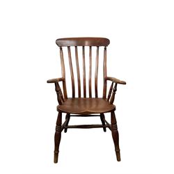 Victorian elm and beech farmhouse chair, the flatted back over elm seat, raised on turned supports 