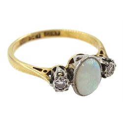 Early 20th century three stone oval opal and diamond chip ring, stamped 18ct Plat