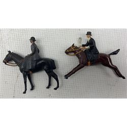 Collection of Britains lead hunting figures including nine on horseback, two standing, seventeen hounds and a fox, 29 pieces